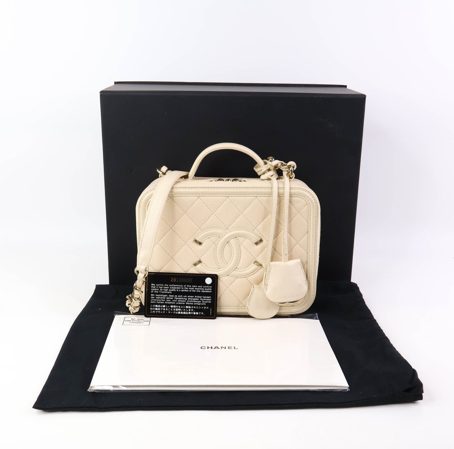 Chanel Filigree Vanity Case White Caviar LGHW